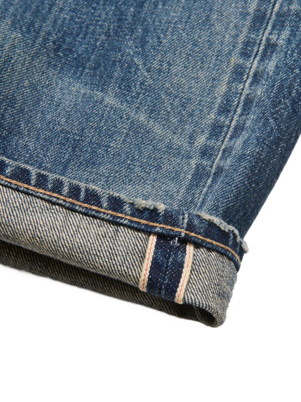 distressed light-wash jeans
