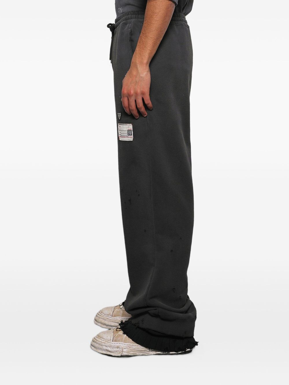 distressed track pants