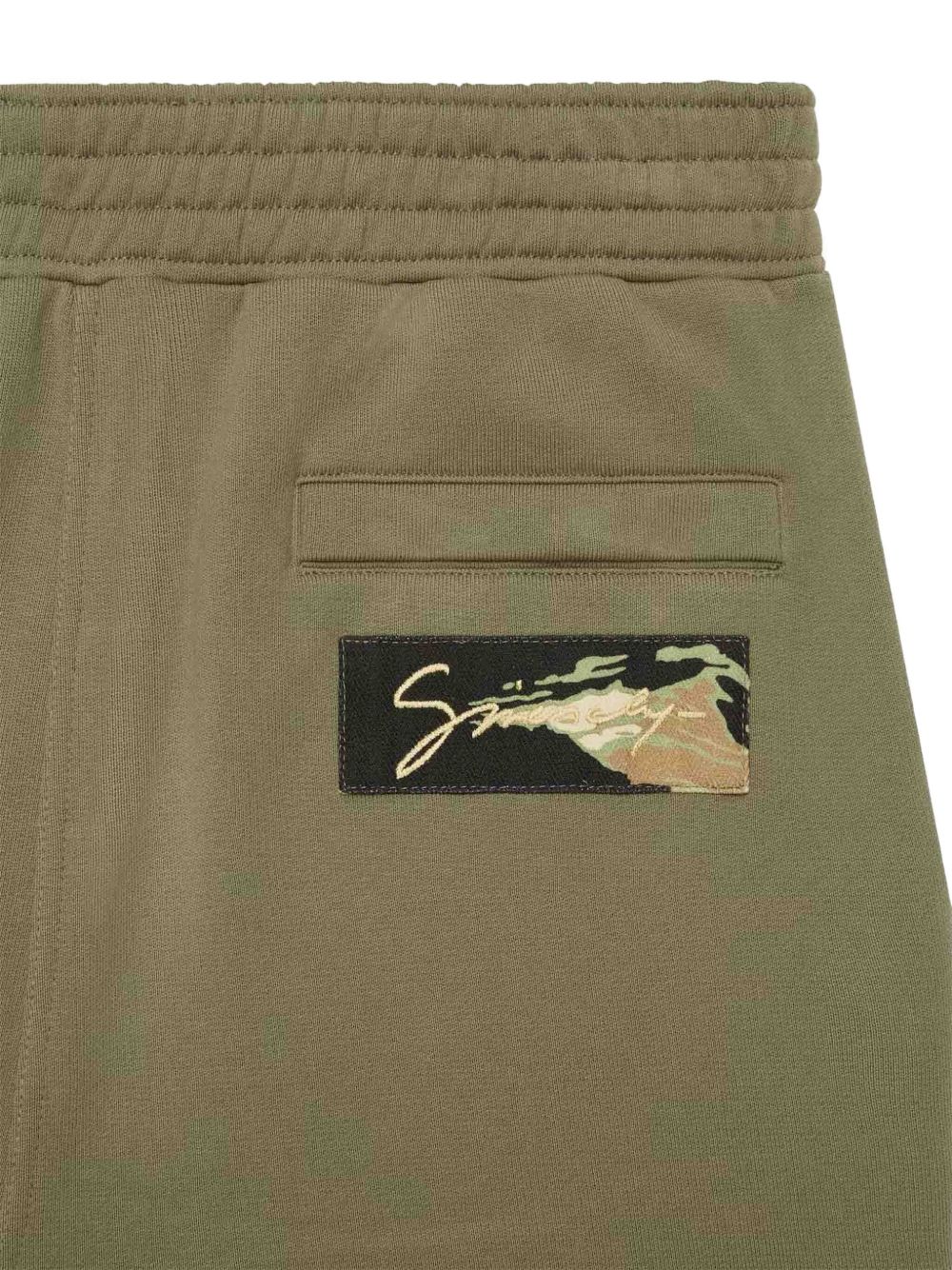 camo-print trousers
