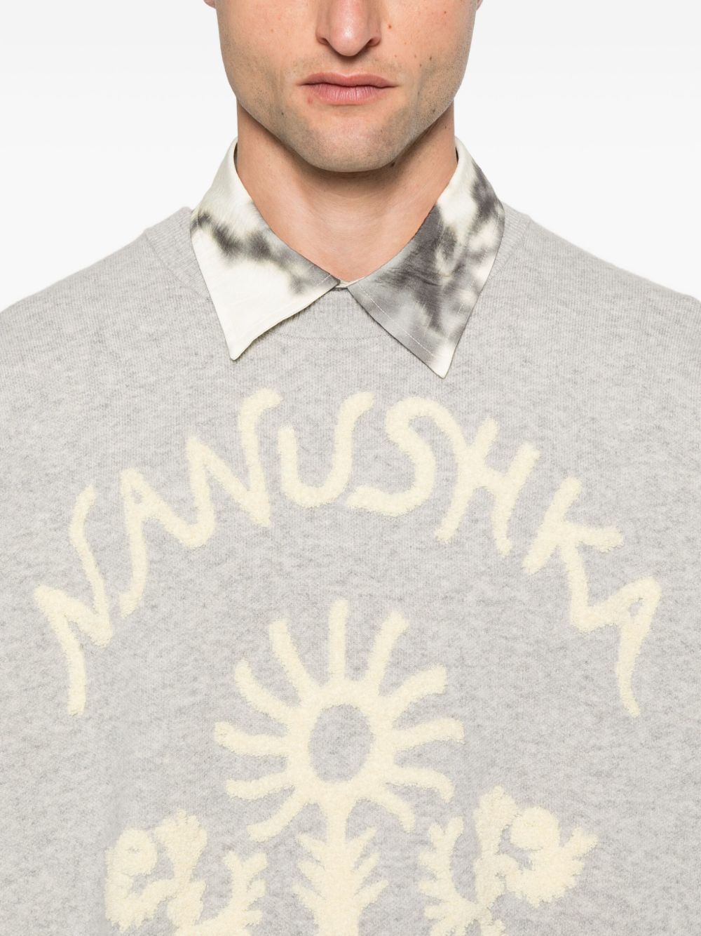 floral-embroidered sweater