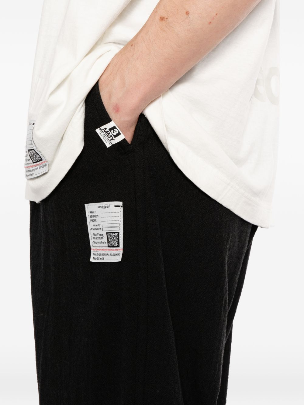 layered wool trousers