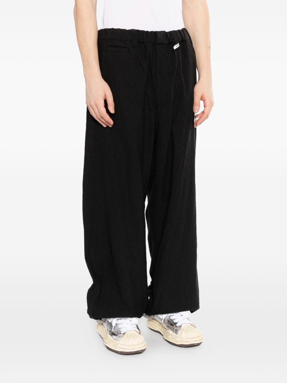 layered wool trousers