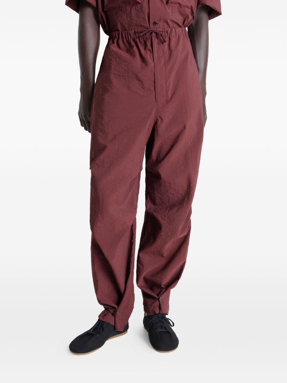 stitched pleats parachute trousers