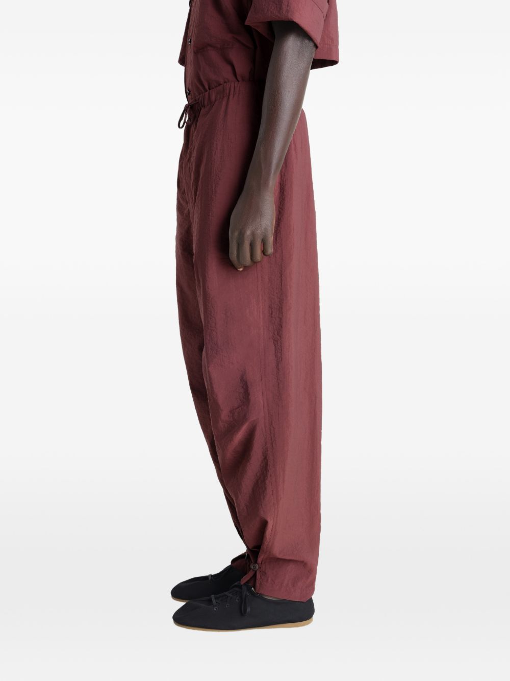 stitched pleats parachute trousers