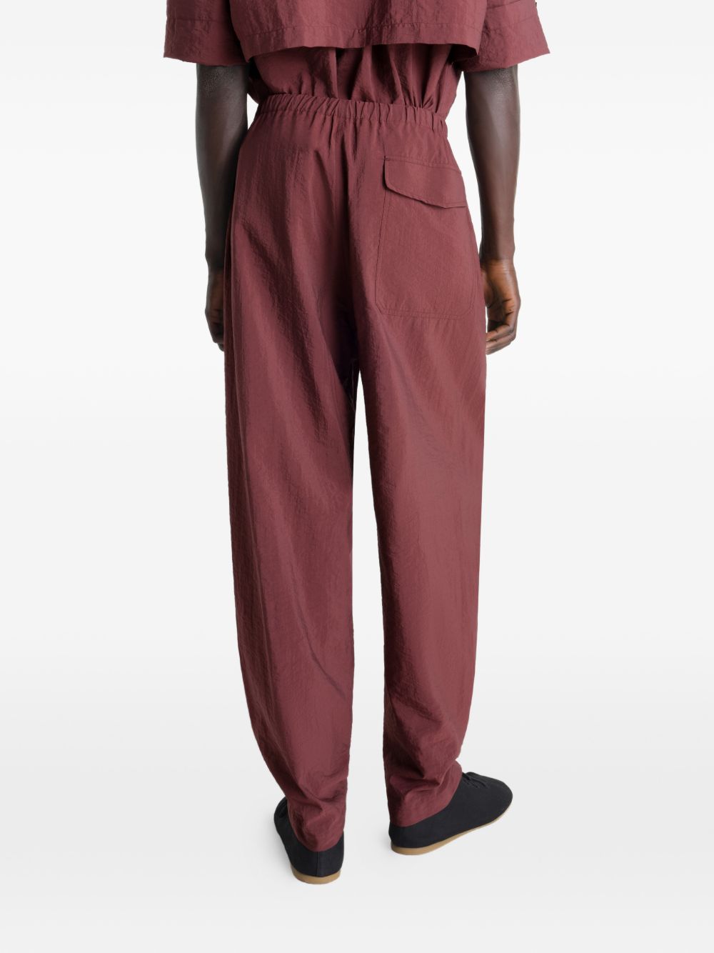 stitched pleats parachute trousers