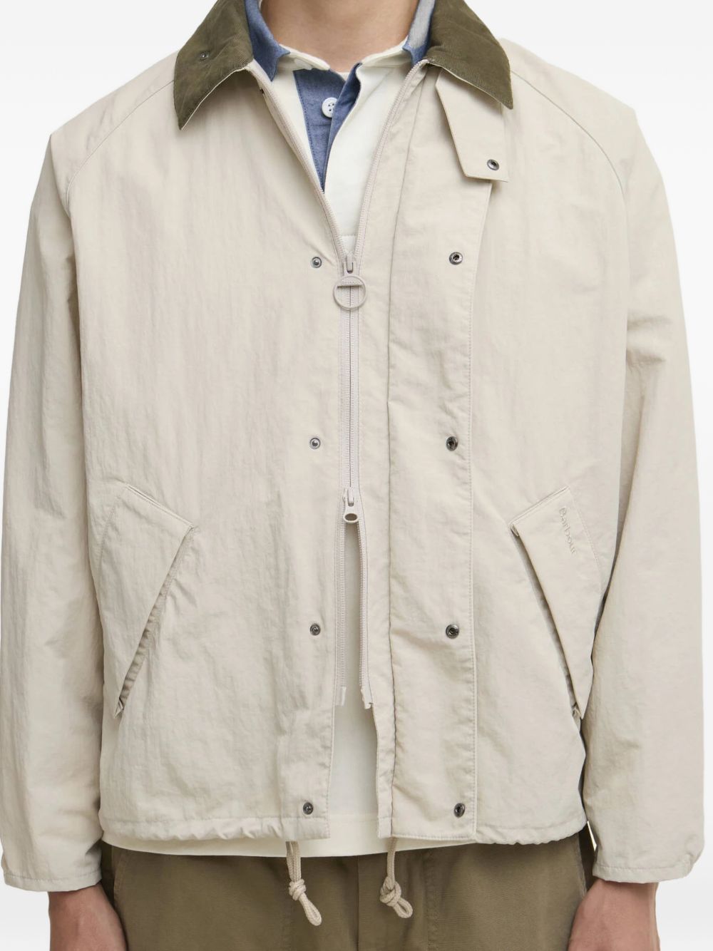 Transport button jacket