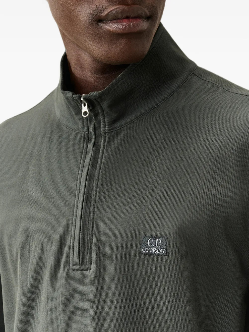 stretch piquet long sleeve half zip polo