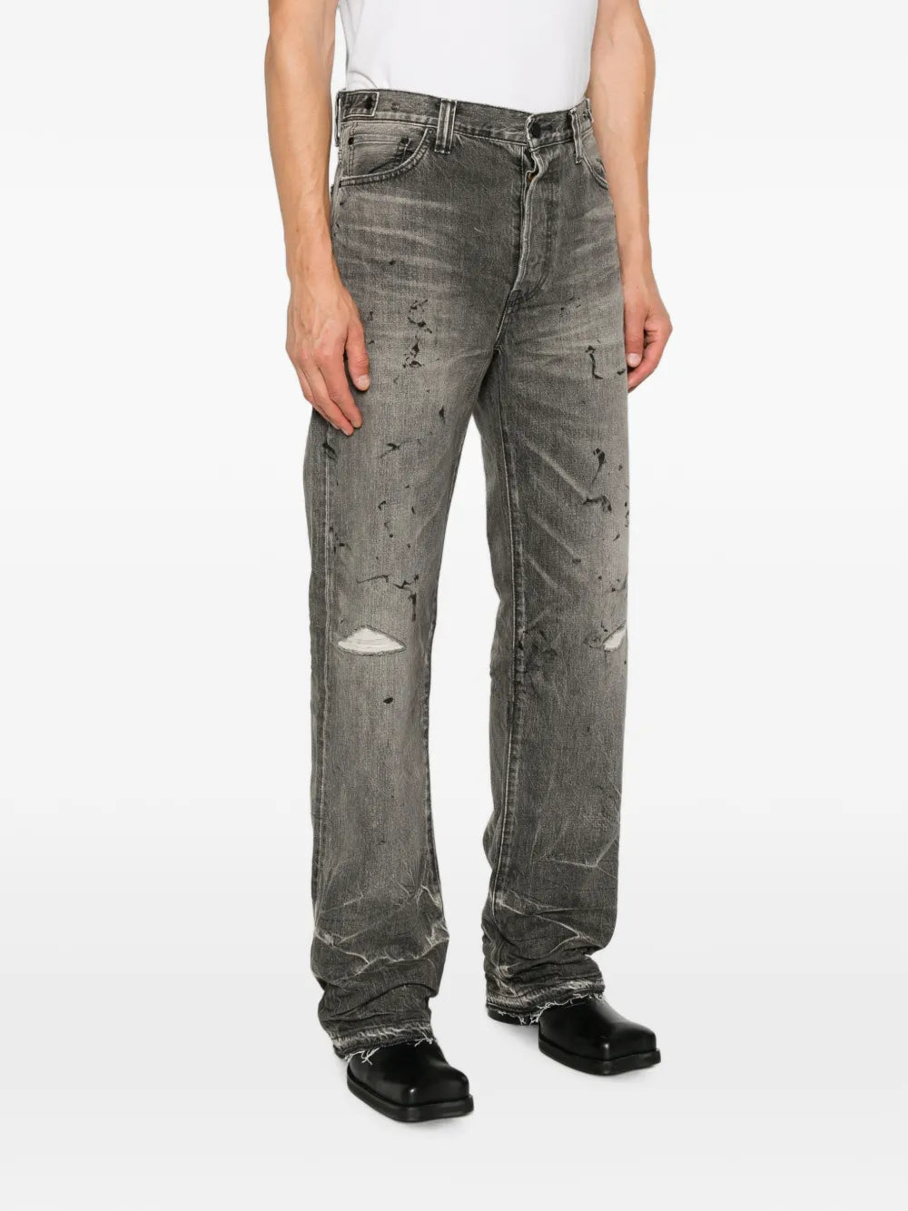 distressed paint-splatter jeans