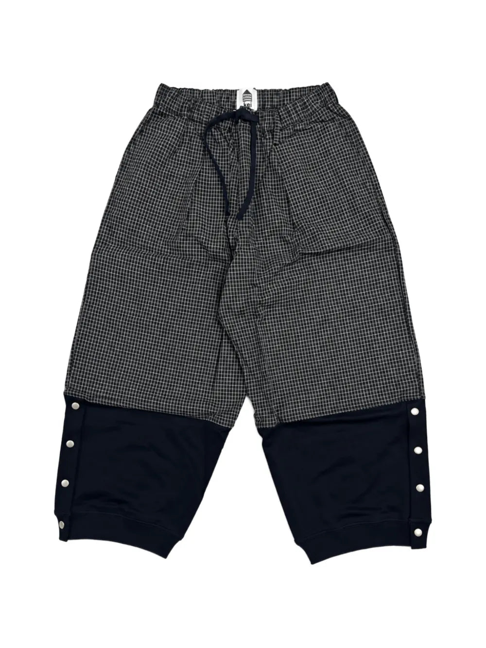 check-pattern panelled trousers